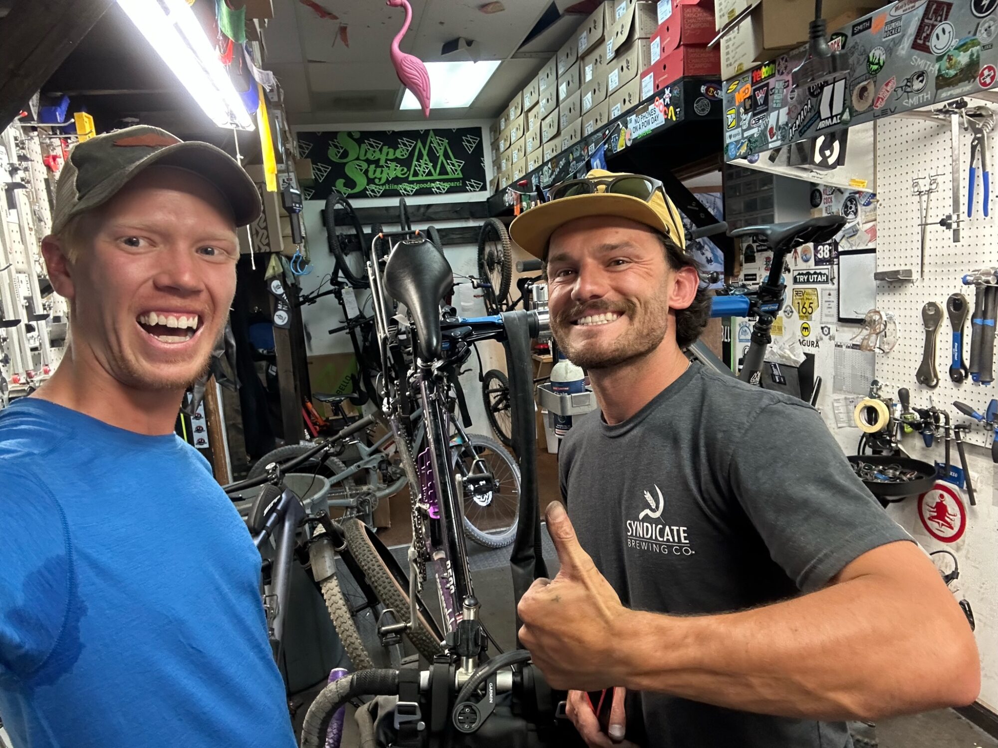 Day 17 - Broken spoke repair at "Slope Style" bike shop - , My mechanic, James - Best in Town!