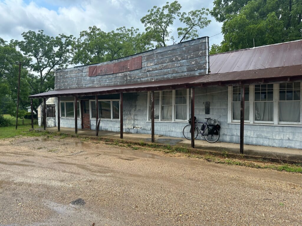 Day 32 - Rain shelter on an old convenience store porch.