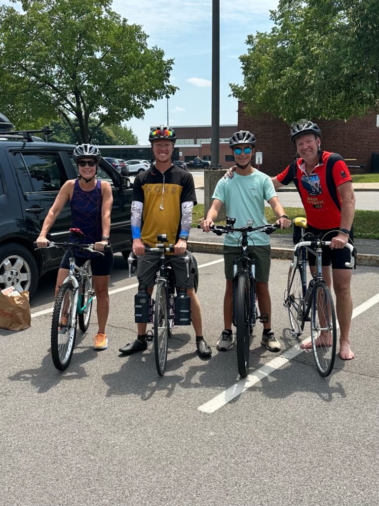 Day 43 - Dad, Mom, Will and I at Wayne Central High School in Ontario, NY. Dad is done, and I'm headed off with Mom and Will for another 12 miles.