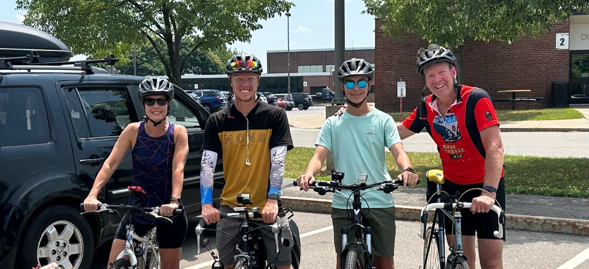 Day 43 - Dad, Mom, Will and I at Wayne Central High School in Ontario, NY. Dad is done, and I'm headed off with Mom and Will for another 12 miles.